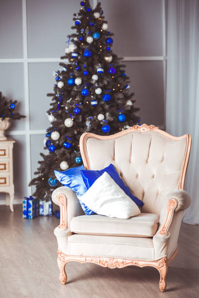 istock Image of chimney and decorated Christmas tree with gift 894426536