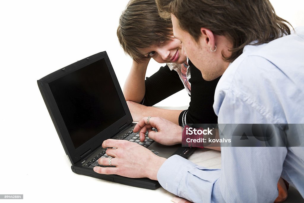 Menino e menina com laptop - Foto de stock de Adolescente royalty-free