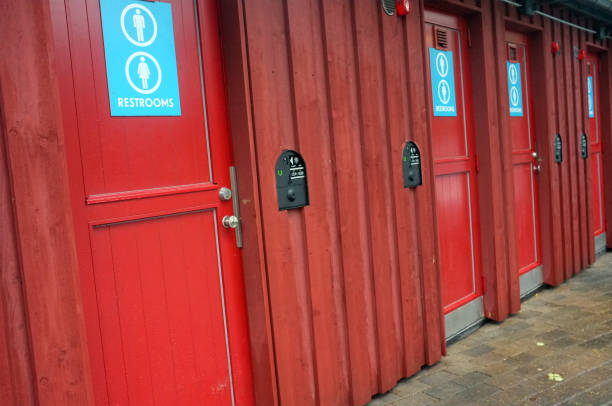 istock Wooden doors with toilet signs 894429190