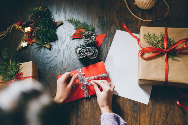 istock Finishing up Christmas cards 894432648