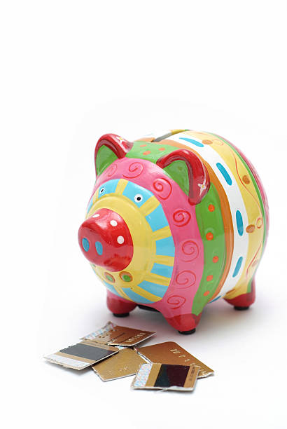 istock Piggy bank eating credit 1 89443847