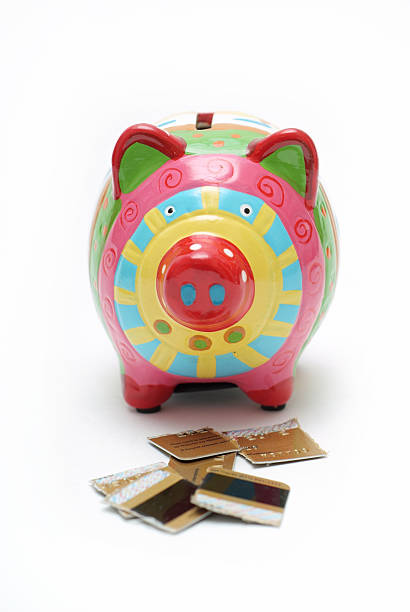istock Piggy bank eating credit 3 89443848
