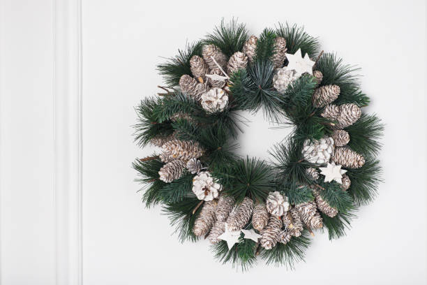 istock Christmas wreath decorated with pine cones 894439808