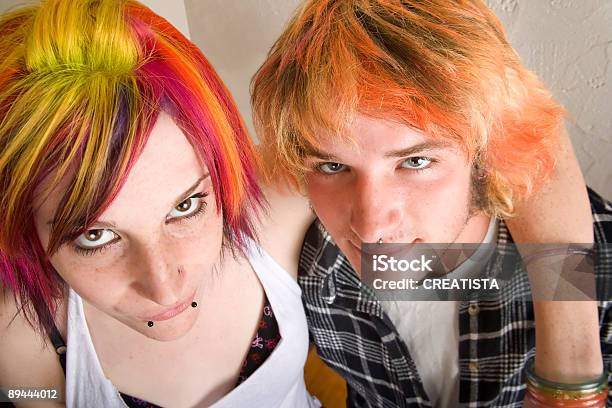 Young Couple With Bright Colored Hair Embrace Stock Photo - Download Image Now - Friendship, Punk - Person, 18-19 Years