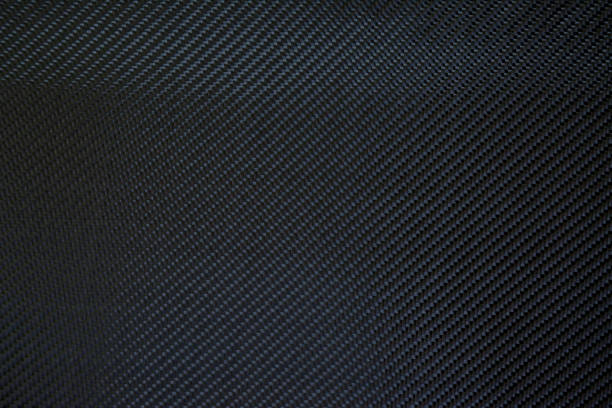 istock Carbon fiber composite raw material background 894442804