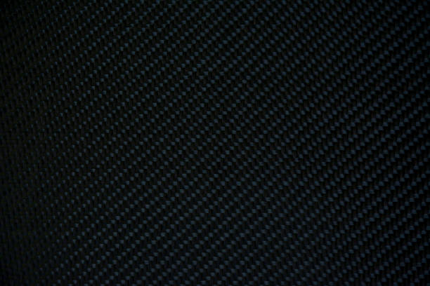 istock Carbon fiber composite raw material background 894443158