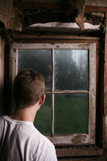 istock Man Looking Out of Window Portrait 89444409