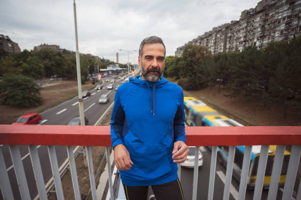 istock Man jogging outdoors 894446058