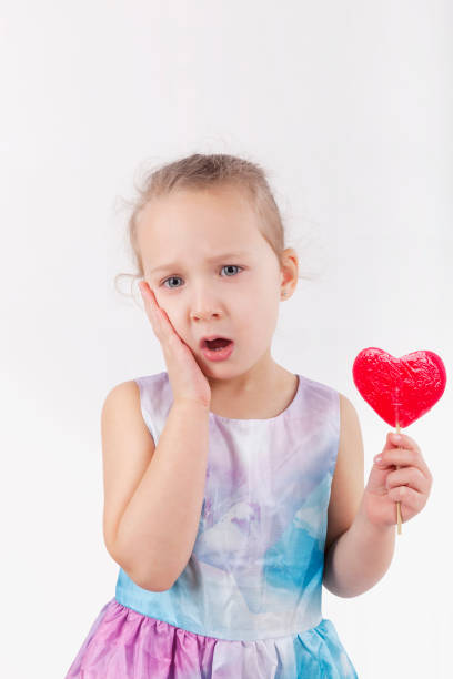 istock Cute girl toothache. 894446956