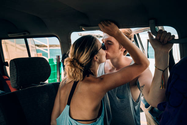 istock Young Couple in a 4x4 894450244