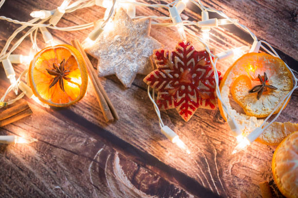 istock Christmas background with lights, ornaments, candy and decorations. Free space 894453560