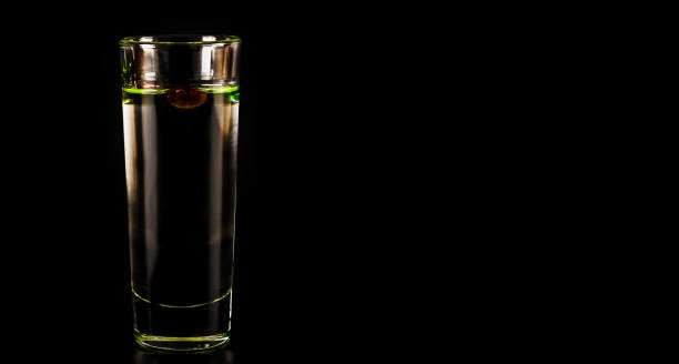 istock aromatic anise alcohol with coffee beans in a glass, drink set 894456398