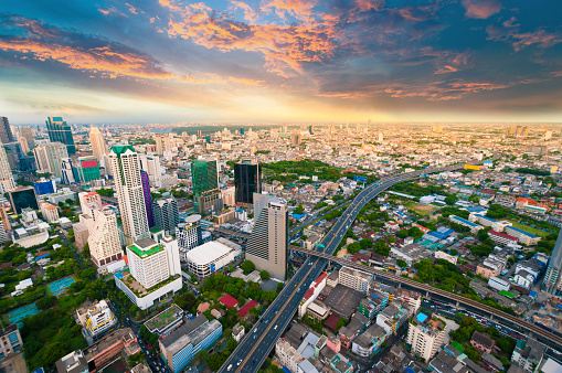 Panoramic view Cityscape business district from aerial view high building at dusk (Bangkok, Thailand)