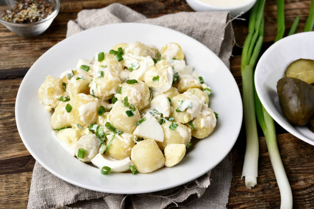 istock Potato salad with eggs and green onion 894463892
