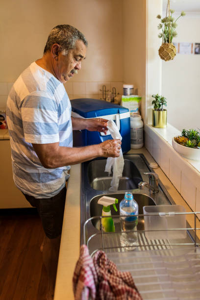 istock Mature Australian Aboriginal Man Preparing for a BBQ 894468806