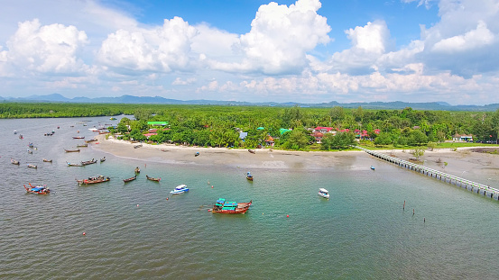 Aerial view tropical sea with long tail boat in south thailand