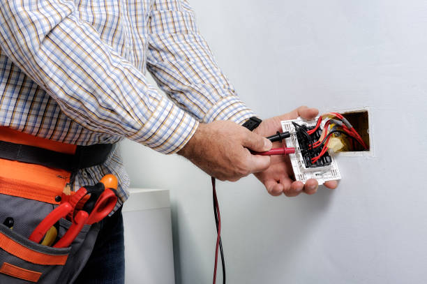 istock Electrician working in a residential electrical system 894471514