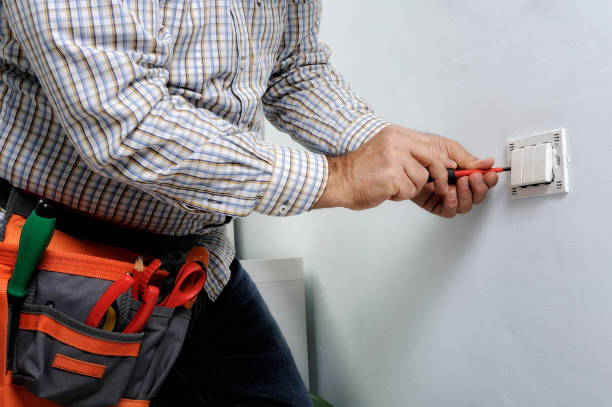istock Electrician working in a residential electrical system 894471532