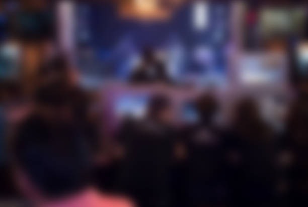istock tv editor working with vision mixer panel at live concert. television engineer crew working with video & audio mixer for broadcasting event on stage in night club. blur background 894484516