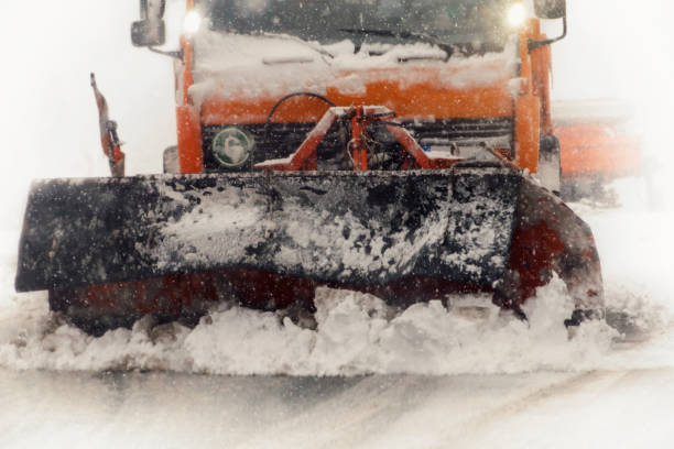 istock Snow plow clearing a snowy highway 894507100