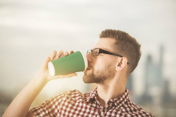 istock Attractive businessman drinking coffee 894513226