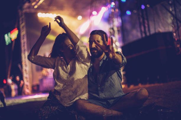 istock Couple on concert outdoors 894520138