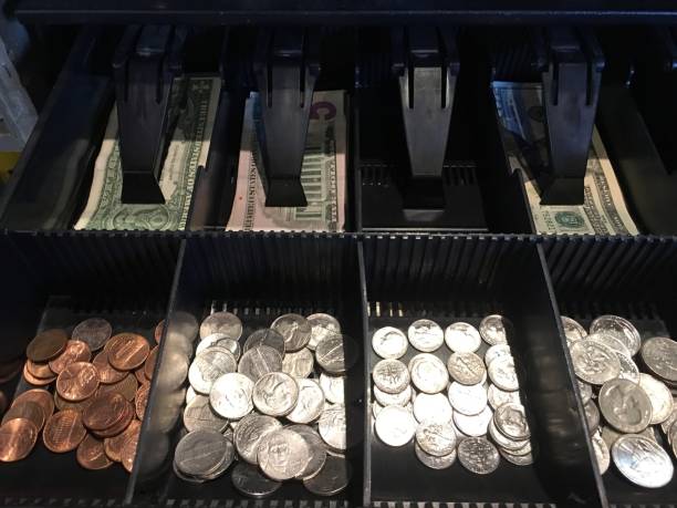 istock Money in a cash drawer 894523730