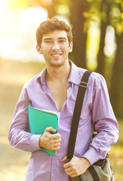 istock successful student with books in the Park 894549658
