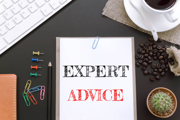 istock Text Expert Advice on white paper background / business concept 894549804