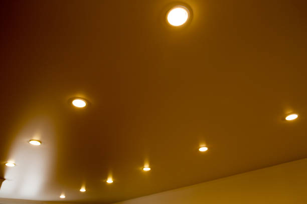 istock lamps on a stretch ceiling in a room 894555522