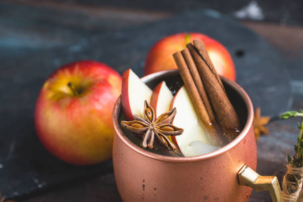 istock Cold Moscow Mule cocktail in copper mug on the rustic background 894559150