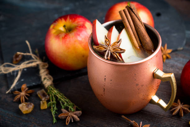 istock Cold Moscow Mule cocktail in copper mug on the rustic background 894559154