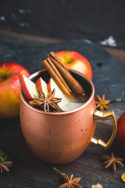 istock Cold Moscow Mule cocktail in copper mug on the rustic background 894559160