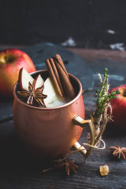 istock Cold Moscow Mule cocktail in copper mug on the rustic background 894559164