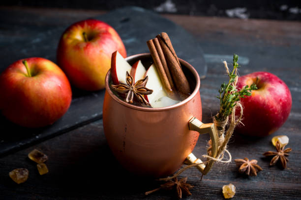 istock Cold Moscow Mule cocktail in copper mug on the rustic background 894559166