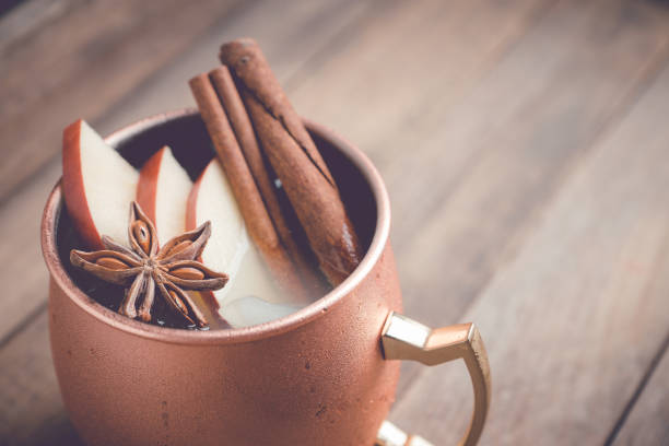 istock Cold Moscow Mule cocktail in copper mug on the rustic background 894559176