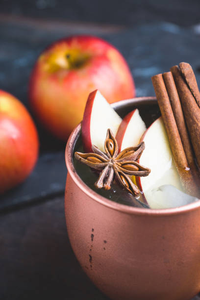 istock Cold Moscow Mule cocktail in copper mug on the rustic background 894559180