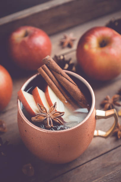 istock Cold Moscow Mule cocktail in copper mug on the rustic background 894559182