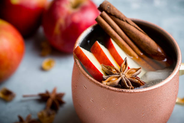 istock Cold Moscow Mule cocktail in copper mug on the rustic background 894559184