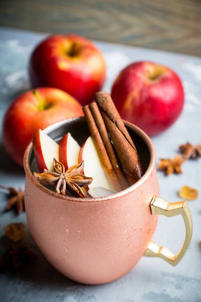 istock Cold Moscow Mule cocktail in copper mug on the rustic background 894559190