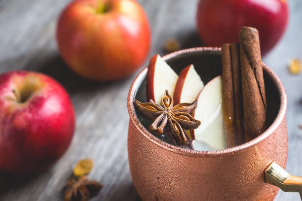 istock Cold Moscow Mule cocktail in copper mug on the rustic background 894559192