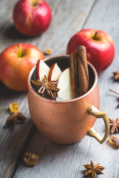 istock Cold Moscow Mule cocktail in copper mug on the rustic background 894559214