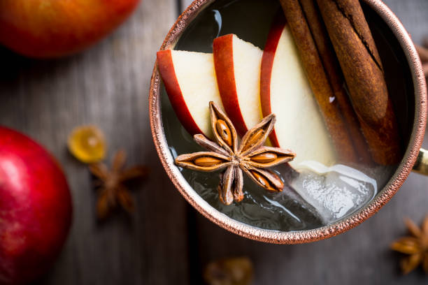 istock Cold Moscow Mule cocktail in copper mug on the rustic background 894559216