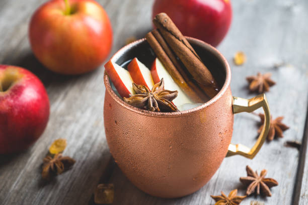 istock Cold Moscow Mule cocktail in copper mug on the rustic background 894559224
