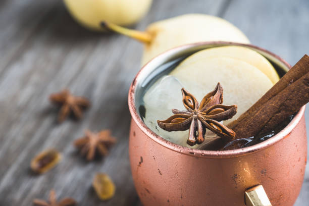 istock Cold Moscow Mule cocktail in copper mug on the rustic background 894559226