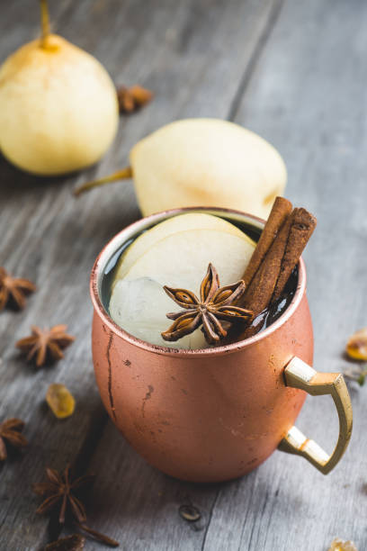 istock Cold Moscow Mule cocktail in copper mug on the rustic background 894559238