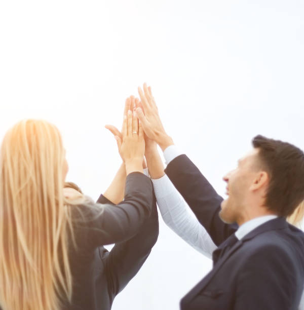 istock concept of successful teamwork - friendly business team 894559456