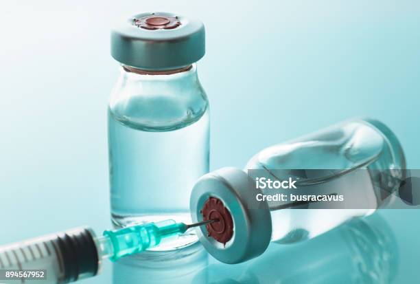 Syringe And Vials Stock Photo - Download Image Now - Bottle, Vaccination, Syringe