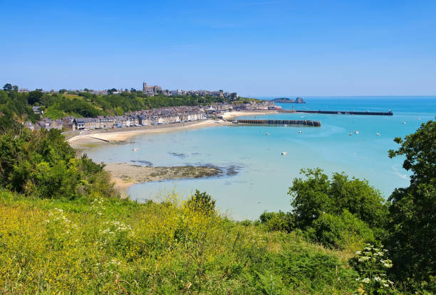 beach and town at Cancale, Emerald Coast of Northern Brittany in France beach and town at Cancale, Emerald Coast of Northern Brittany in France cancale photos stock pictures, royalty-free photos & images