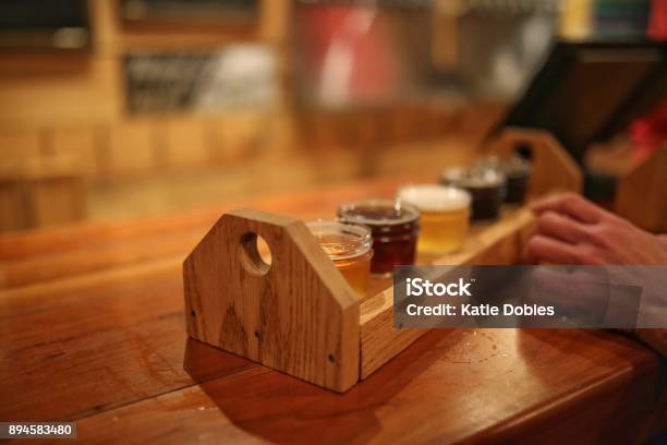 Micro Brew Craft Beer Tasting Bar Sampler Stock Photo - Download Image Now - Artisanal Food and Drink, Bar - Drink Establishment, Beer - Alcohol